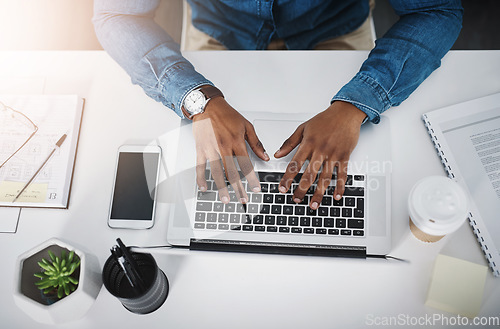 Image of Business man, working hands and laptop typing of a creative employee with lens flare at desk. From above, employee and digital writing of a web worker on online app and keyboard for a tech design