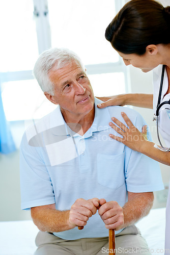 Image of Support, nurse and old man with cane in hospital for advice, help and rehab at senior care clinic. Healthcare in retirement, counselling and elderly patient with disability on bed with woman doctor