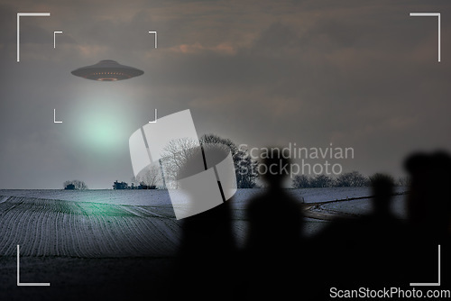 Image of UFO, alien and camcorder on a camera display to record a flying saucer in the sky over area 51. Viewfinder, sighting and conspiracy with a spaceship on a recording device screen outdoor in nature