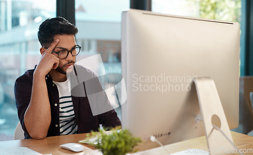 Image of Business man, bored and thinking at computer desk while online for research with poor internet. Male entrepreneur person tired or frustrated with connection glitch or problem while reading email