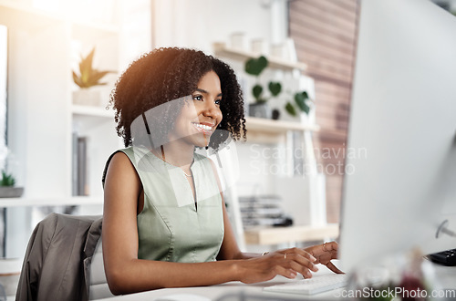 Image of Research, smile and business woman on a computer in office, happy and satisfied with web search. Online, review and African female person smiling for report, proposal or creative design inspiration