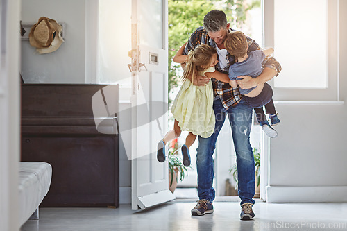 Image of Hug, welcome and a father with children at front door, greeting after work and excited to be home. Happy, family and a dad hugging a girl and boy kid after arriving from a job with love in a house