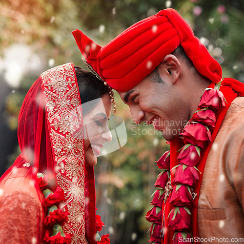 Image of Wedding, marriage and hindu couple together in celebration of love or commitment at a ceremony. Happy, romance or islamic with a birde and groom getting married outdoor in tradition of their culture