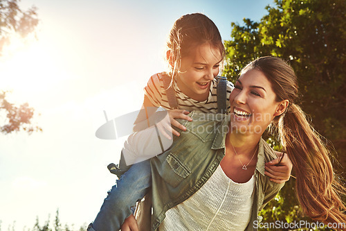 Image of Piggyback, happy and a mother and child in nature for bonding, happiness and love in summer. Laughing, relax and a mom and a girl kid in a park or garden for playing together and quality time