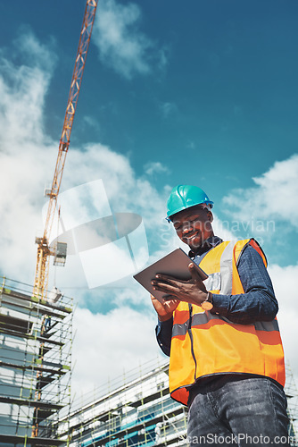 Image of Engineer man, construction and a tablet for project management, development and architecture. Happy African male contractor with mobile app for engineering and safety inspection or planning outdoor
