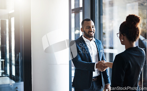 Image of Hand shake, man and woman in hallway for welcome, b2b collaboration or business meeting with respect. Businessman, partnership and shaking hands for human resources, hiring or greeting in workplace