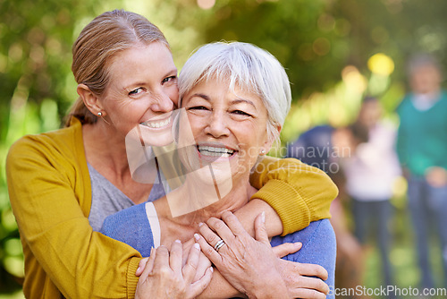 Image of Mom, old woman and laughing with hug outdoor for happiness, love and care in portrait on holiday. Elderly mama, lady and embrace with bond, excited face and family in backyard with summer sunshine