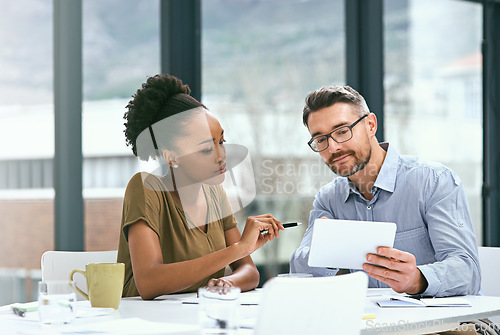 Image of Meeting, teamwork and employees with a tablet, planning and share ideas for new project, email or social media. Coworkers, partnership or staff with technology, brainstorming or discussion in office