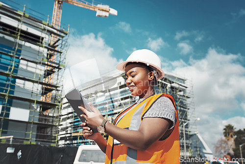 Image of Outdoor, business an black woman with a tablet, construction site and update schedule for new project. Female person, employee or inspector with technology, check progress or architecture with growth