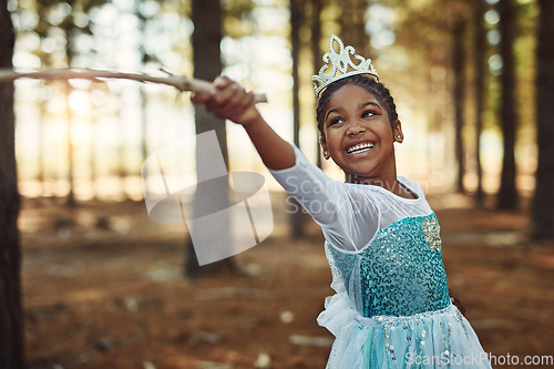 Image of Forest, princess costume and girl with stick for playing fantasy, childhood games and happiness. Nature, fairy tale and face of happy child in woods play with branch for adventure, freedom and fun