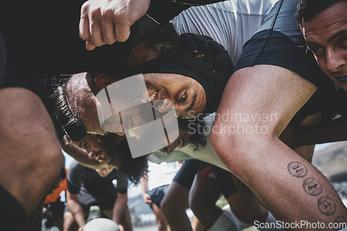 Image of Fitness, rugby and team in a scrum on a field during a game, workout or training in a stadium. Sports, performance and group of athletes in position on an outdoor pitch for a match or practice.