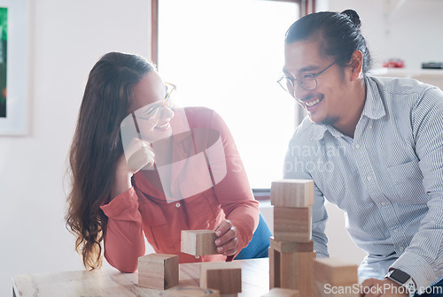 Image of Team building, businessman and woman with wood blocks in office for vision challenge game and design innovation ideas. Engineering, architecture and creative startup with problem solving block games