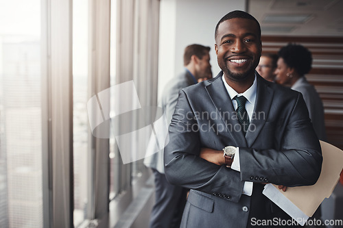 Image of Black man in business, arms crossed with smile in portrait and leadership, corporate lawyer in meeting. Businessman in conference room, happy male person with confidence in company and management