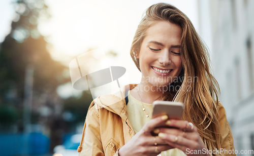 Image of Happy woman check social media on smartphone, communication in city and chat online with connectivity. Young person and student smile at meme in urban street, contact with mobile app and tech outdoor