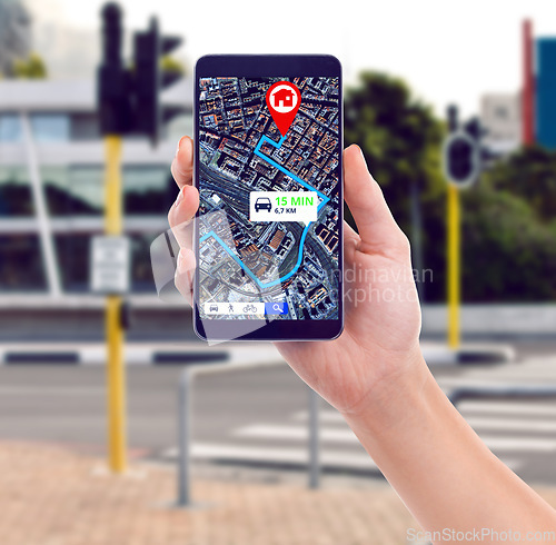 Image of Closeup, city and hand with a smartphone, map and connection for direction, travel or streets. Holding a cellphone, person or traveler with a mobile app, roads or technology for transport or location