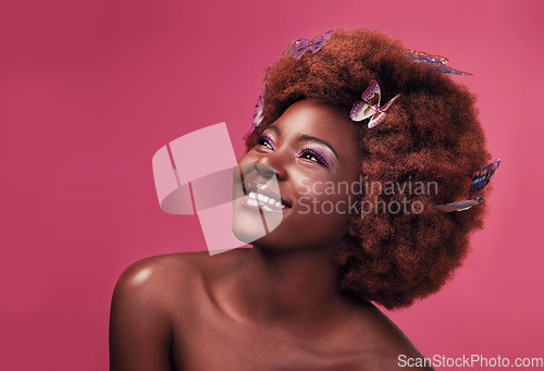 Image of Thinking, smile and black woman with butterflies in her hair, fantasy and natural against a studio background. Female person, girl and model with joy, ideas and happiness with confidence and beauty