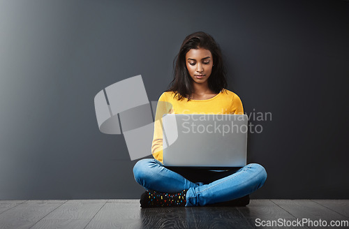 Image of Woman, laptop and technology, student typing report with education, mockup space and connectivity. Focus, concentration and female person studying, research online for project and internet connection