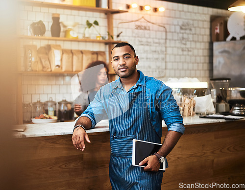 Image of Waiter, tablet and portrait of man in coffee shop for online, entrepreneurship and startup. Retail, technology and food industry with small business owner in restaurant for barista, store and cafe