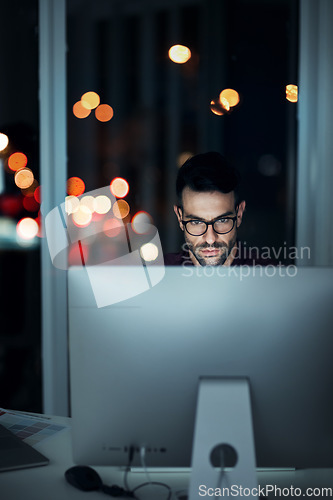 Image of Night, computer and serious business man in office for internet code, coding or software development. Technology, cloud computing and cyber security with male programmer for app, developer and it