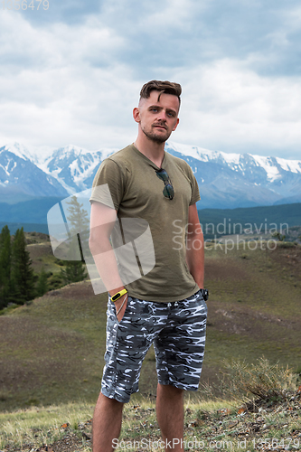 Image of Relaxing man in Kurai steppe on North-Chui ridge