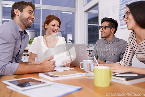 Image of Team laughing together, creative people in meeting with collaboration and project planning in conference room. Brainstorming, teamwork with young men and women in strategy discussion in workplace