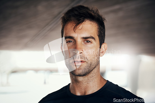 Image of Serious, portrait and man breathing in workout, exercise or training at gym or athlete, sports and healthy fitness with confidence. Male person, face and sweat or focus on cardio or wellness routine
