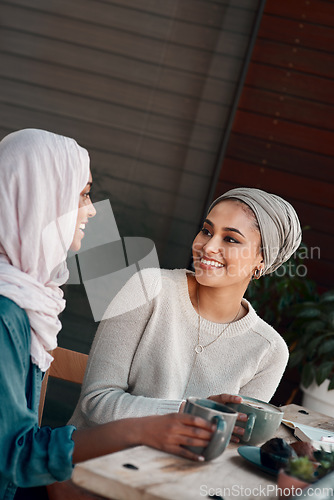 Image of Friends, coffee and relax with Muslim women in cafe for conversation, food and social. Happy, smile and culture with arabic female customer in restaurant for discussion, happiness and meeting