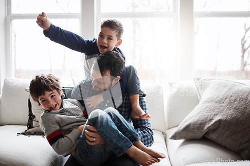 Image of Dad with boy children, playing and energy with fun, carefree with love and laughter at family home. Man play with kids laughing in living room, crazy and playful with piggyback, hug and excited