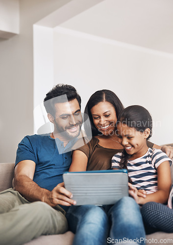 Image of Family on a couch, happiness and tablet with connection, social media and watching a cartoon. Parents, mother and father with female child, daughter or technology for a movie, film or bonding at home
