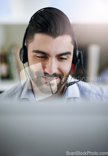 Image of Communication, face or happy man in call center consulting, speaking or talking at customer services. Virtual assistant, friendly or sales consultant in telemarketing or telecom company help desk