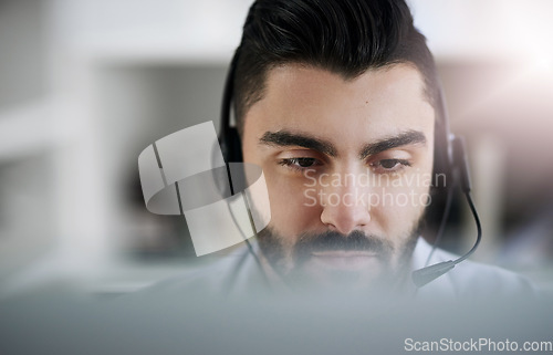 Image of Communication, face or man in call center consulting, speaking or talking at customer services. Virtual assistant, contact us or sales consultant in telemarketing or telecom company help desk office