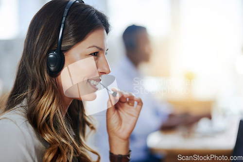 Image of Communication, mic or happy woman in call center consulting, speaking or talking at customer services. Virtual assistant, friendly or sales consultant in telemarketing or telecom company help desk