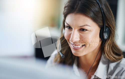 Image of Communication, face or friendly woman in call center consulting, speaking or talking at customer services. Virtual assistant, happy or sales consultant in telemarketing or telecom company help desk