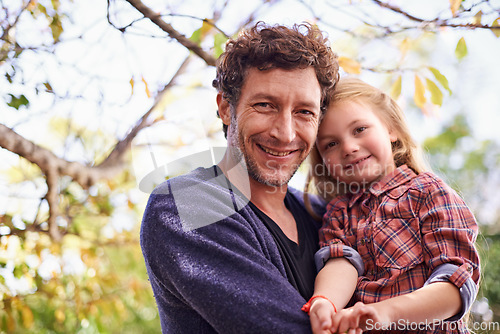 Image of Happy, love and portrait of father and daughter in backyard garden for hugging, bonding or affectionate. Happiness, relax and family with man and young girl in outdoors for embrace, autumn and care