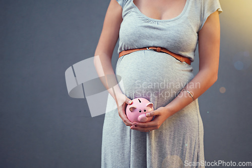Image of Pregnant woman, piggy bank and savings for newborn, baby and family investment or money, budget and planning for future finance. Pregnancy, mother and investing cash on studio gray background