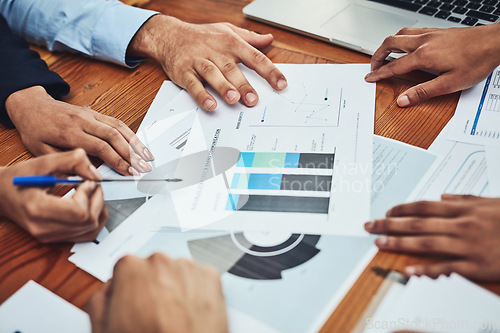 Image of Business people, hands and meeting in analytics for data, chart or graphs of company statistics at the office. Hand of employee group in corporate analysis for document information or team paperwork