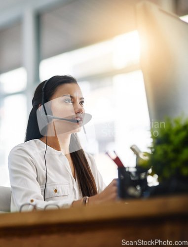 Image of Virtual assistant, customer services or woman in call center consulting, speaking or talking at help desk. Communication, contact us or sales consultant in telemarketing or telecom company office
