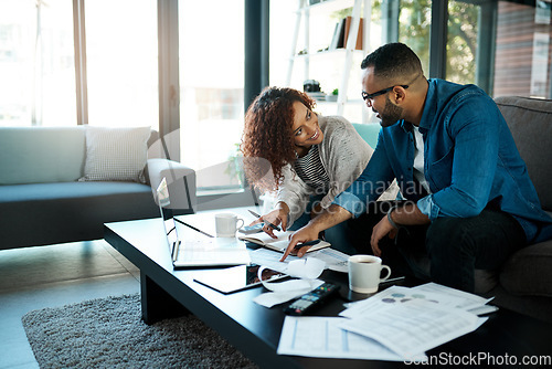 Image of Couple with budget planning, bills and accounting of home, people with notes to pay loan and mortgage debt. Tax paperwork, man and woman happy with financial review of spending, income and savings