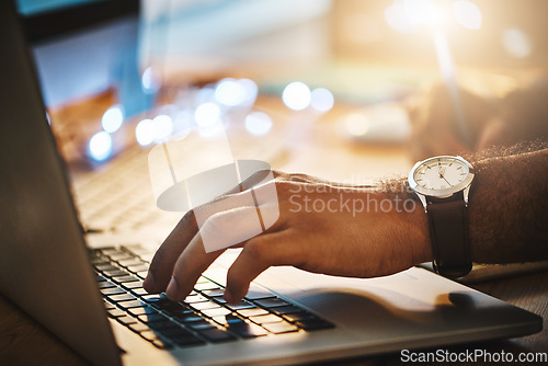 Image of Hand, office and businessman typing on laptop while doing research for corporate project at night. Planning, professional and closeup of male employee working overtime with computer in the workplace.