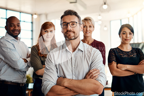 Image of Businessman, portrait and arms crossed in management, leadership or executive team at office. Confident business people or professional standing in confidence for teamwork or about us at workplace