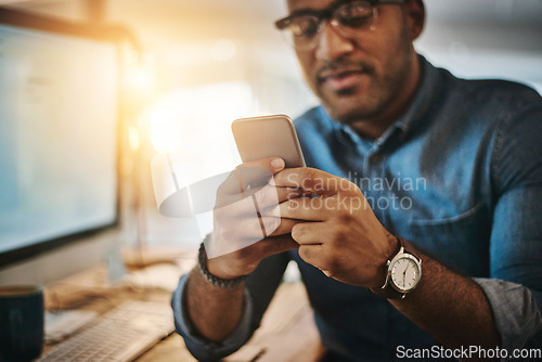 Image of Night, business and man with a smartphone, typing and connection for social media, network or communication. Male person, employee or consultant with a cellphone, evening or texting to search website