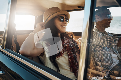 Image of Happy couple, summer and on a road trip in a car for freedom, travel and holiday. Smile, relax and a young man and woman in transportation driving for a vacation, date or an adventure together