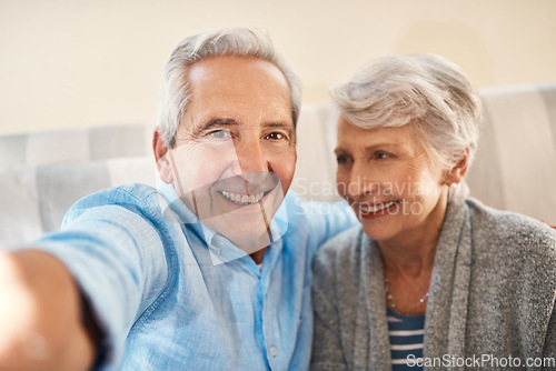 Image of Senior couple, happy selfie and couch in retirement home for social media, blog post and internet. Elderly man, woman and photography for profile picture on app, web or smile together on lounge sofa