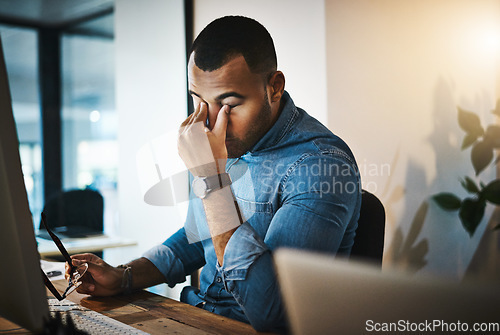 Image of Burnout, headache and man in the office while working on a deadline project with eye strain at night. Stress, migraine and professional male employee doing research on computer in workplace overtime.