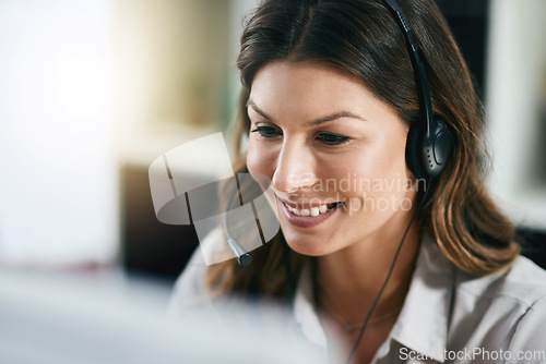 Image of Communication, face or happy woman in call center consulting, speaking or talking at customer services. Virtual assistant, friendly or sales consultant in telemarketing or telecom company help desk