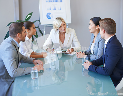 Image of Business people in a meeting, teamwork and discussion in conference room with diversity in corporate group. Men, women and female team leader with conversation, data analytics and collaboration