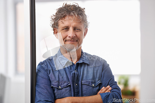 Image of Portrait, mature and business man with arms crossed in office with pride for career, job or occupation. Entrepreneur, professional and male executive, confident boss and serious person from Australia