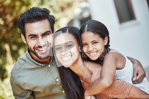 Image of Happy family, nature and portrait together with smile in a garden or backyard of a house. Love, quality time and a father, mother and girl child with piggyback in a park for happiness and bonding