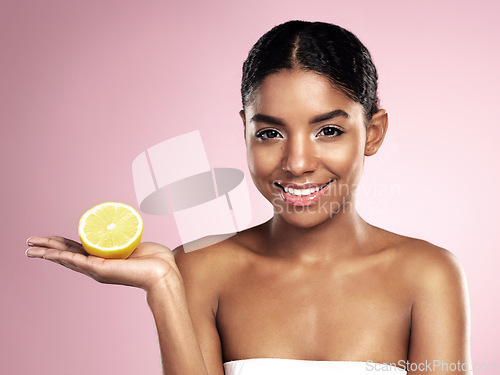 Image of Lemon fruit, skincare and portrait of happy woman in studio mockup, pink background and vitamin c benefits. Face of african model, citrus and natural beauty for cosmetics, vegan dermatology and shine