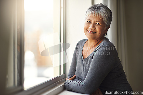 Image of Window, portrait and senior woman with freedom, relax and cheerful at home, carefree and sunny. Face, mature female person and happy old lady with wellness, retirement and happiness with sunshine